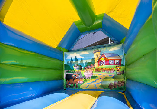 Un mediano de castillo hinchable a la venta con tema de granja para niños. Ordena castillos hinchables en línea en JB Hinchables España