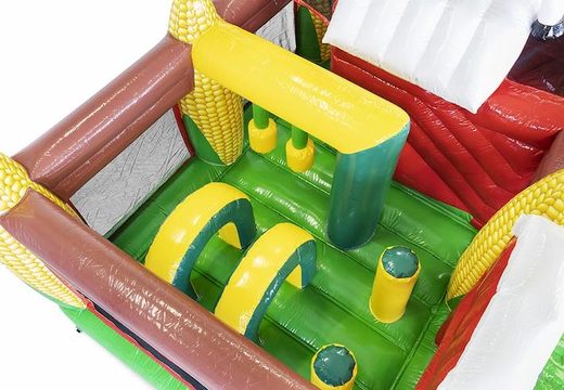Comprar cojín de aire hinchable con temática de granja con tobogán para niños
