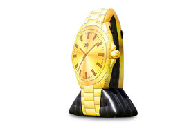 Ordene un reloj de oro inflable de 4 metros de altura. Compre castillos hinchables ahora en línea en JB Hinchables España