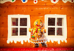 Ilustración de una figura de jengibre y ventanas en el castillo hinchable Multifun JB