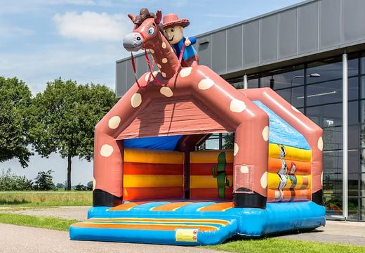 Compra un grande castillo inflable  con un tema  vaquero para niños. Compra castillos inflable en línea en JB Hinchables España