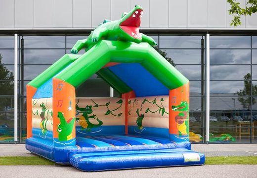 Compra un grande castillo inflable con un tema cocodrilo para niños. Ordena castillos inflable en línea en JB Hinchables España