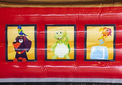 Pedir colchón de aire de castillo hinchable con tobogán en tema de hotel de animales para niños