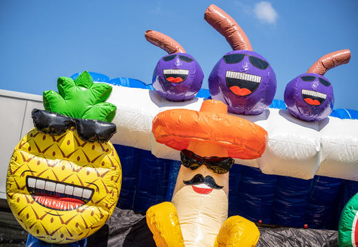 Tobogán de agua inflable grande con tema caribeño con muchos colores y orden de 3 objetos para niños