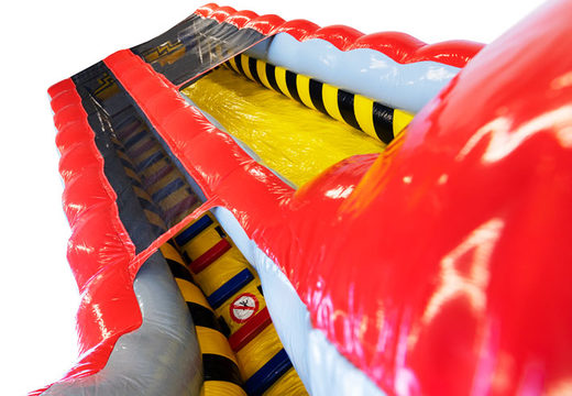 Tobogán con rojo, amarillo y negro a la venta en JB Inflatables